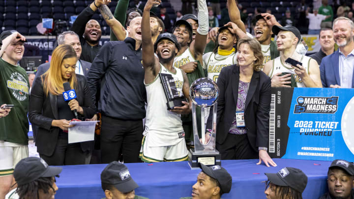 Mar 12, 2022; Frisco, TX, USA; UAB Blazers guard Jordan Walker (10) takes a selfie video with UAB Blazers head coach Andy Kennedy and the rest of the team after defeating the Louisiana Tech Bulldogs 82-73 in the Conference USA basketball tournament championship game at Ford Center at The Star. Mandatory Credit: Ivan Pierre Aguirre-USA TODAY Sports”