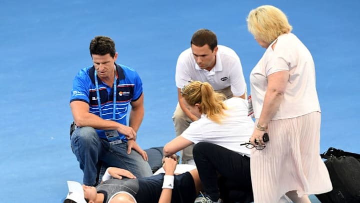 BRISBANE, AUSTRALIA - JANUARY 02: Garbine Muguruza of Spain is injured in her match against Aleksandra Krunic of Serbia during day three of the 2018 Brisbane International at Pat Rafter Arena on January 2, 2018 in Brisbane, Australia. (Photo by Bradley Kanaris/Getty Images)