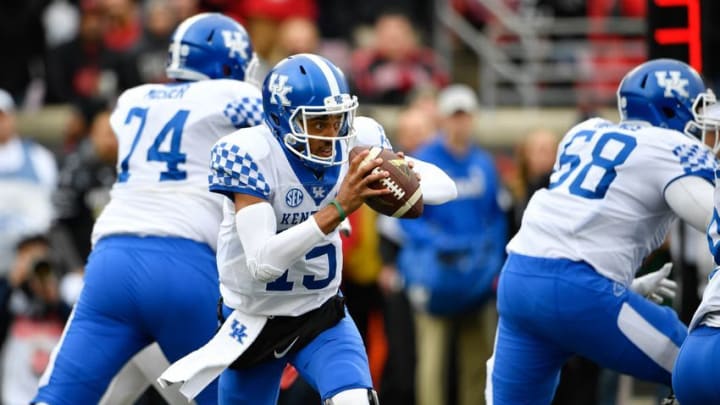 Nov 26, 2016; Louisville, KY, USA; Kentucky Wildcats quarterback Stephen Johnson (15) runs the ball against the Louisville Cardinals during the first quarter at Papa John