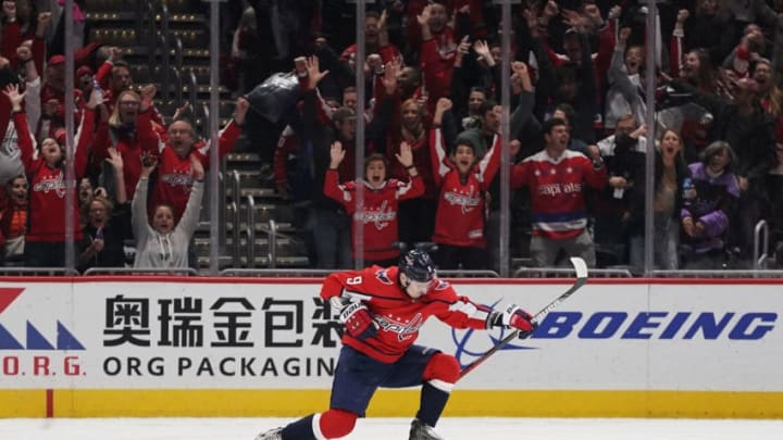 WASHINGTON, DC - NOVEMBER 29: Dmitry Orlov #9 of the Washington Capitals celebrates after scoring the game-winning goal in overtime against the Tampa Bay Lightning at Capital One Arena on November 29, 2019 in Washington, DC. (Photo by Patrick McDermott/NHLI via Getty Images)