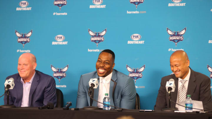 CHARLOTTE, NC- JUNE 26: Rich Cho and Steve Clifford introduce Dwight Howard
