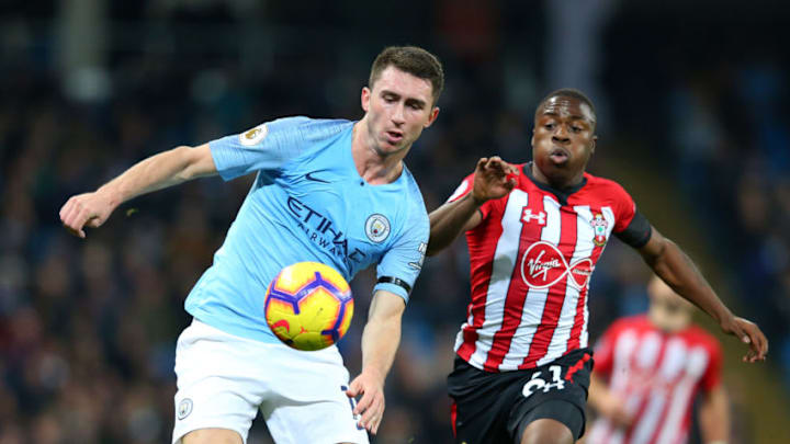 MANCHESTER, ENGLAND - NOVEMBER 04: Aymeric Laporte of Manchester City battles for possession with Michael Obafemi of Southampton during the Premier League match between Manchester City and Southampton FC at Etihad Stadium on November 4, 2018 in Manchester, United Kingdom. (Photo by Alex Livesey/Getty Images)