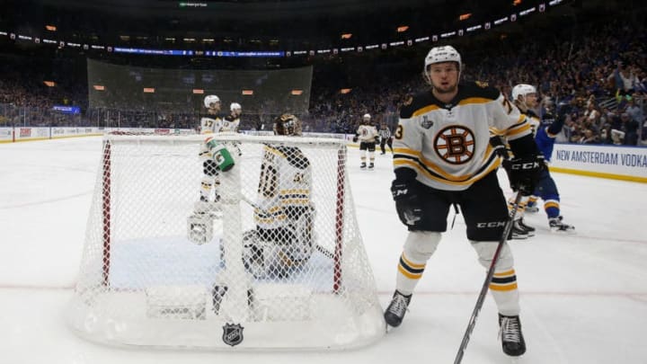 ST LOUIS, MISSOURI - JUNE 03: Charlie McAvoy #73 and Tuukka Rask #40 of the Boston Bruins looks on after Ryan O'Reilly #90 of the St. Louis Blues scores a third period goal at 10:38 in Game Four of the 2019 NHL Stanley Cup Final at Enterprise Center on June 03, 2019 in St Louis, Missouri. (Photo by Jamie Squire/Getty Images)