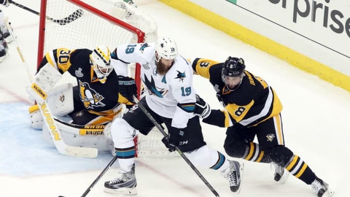 Jun 1, 2016; Pittsburgh, PA, USA; Pittsburgh Penguins goalie Matt Murray (30) and defenseman Brian Dumoulin (8) defend San Jose Sharks center Joe Thornton (19) during the third period in game two of the 2016 Stanley Cup Final at the CONSOL Energy Center. The Penguins won 2-1 in overtime. Mandatory Credit: Charles LeClaire-USA TODAY Sports