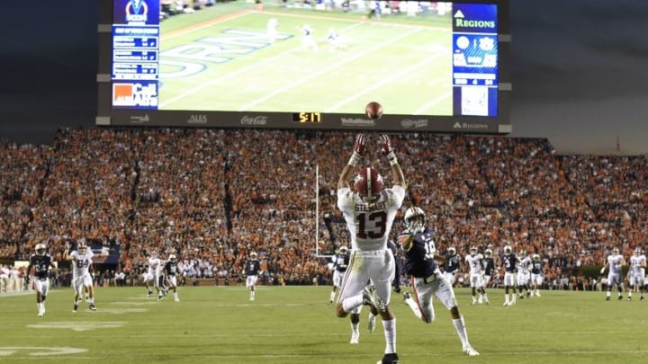 Nov 28, 2015; Auburn, AL, USA; Alabama Crimson Tide wide receiver ArDarius Stewart (13) catches a touchdown pass past Auburn Tigers defensive back Carlton Davis (18) in the third quarter at Jordan Hare Stadium. Mandatory Credit: RVR Photos-USA TODAY Sports