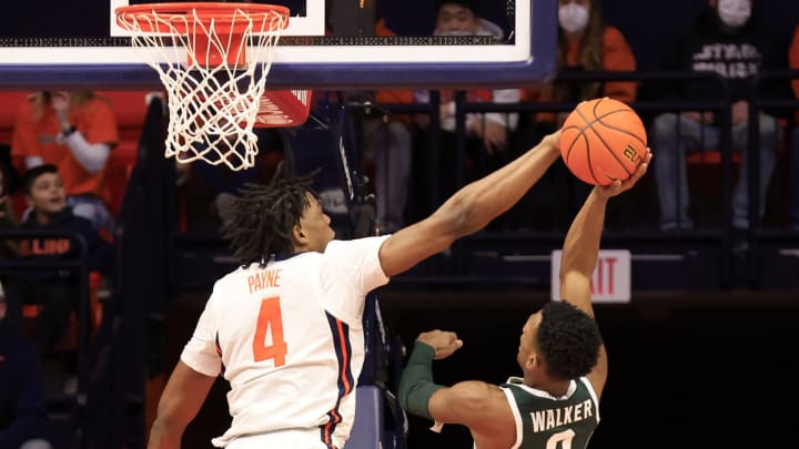 CHAMPAIGN, ILLINOIS – JANUARY 25: Omar Payne #4 of the Illinois Fighting Illini blocks the shot of Tyson Walker #2 of the Michigan State Spartans during the first half at State Farm Center on January 25, 2022 in Champaign, Illinois. (Photo by Justin Casterline/Getty Images)