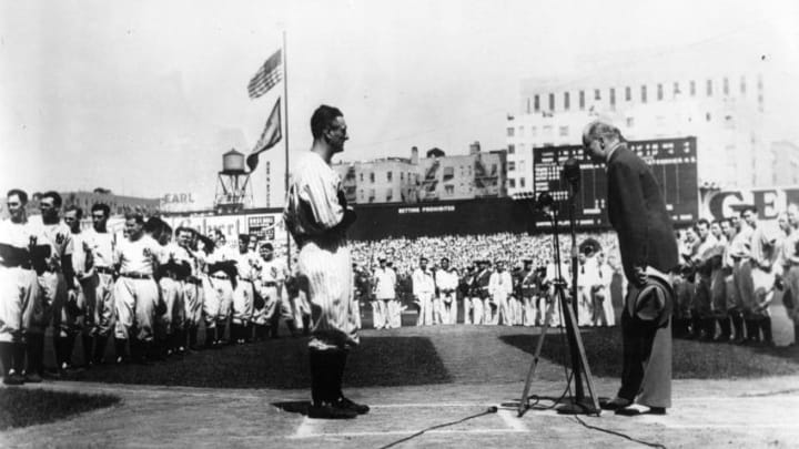 NEW YORK, NY - JULY 04: Lou Gehrig stands in front a microphone in Yankee Stadium to deliver his farewell address on July 4, 1939 in New York CIty. (Photo Reproduction by Transcendental Graphics/Getty Images)