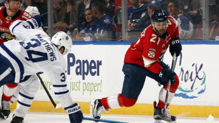 SUNRISE, FL - JANUARY 18: Vincent Trocheck #21 of the Florida Panthers skates with the puck against Auston Matthews #34 of the Toronto Maple Leafs at the BB&T Center on January 18, 2019 in Sunrise, Florida. (Photo by Eliot J. Schechter/NHLI via Getty Images)