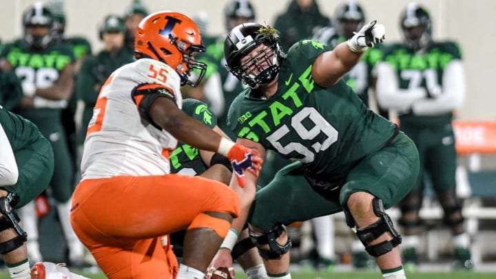 Michigan State’s center Nick Samac calls out to teammates before a snap during the third quarter on Saturday, Nov. 9, 2019, at Spartan Stadium in East Lansing. 191109 Msu Ill 190a