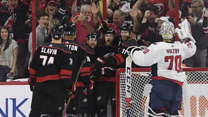 RALEIGH, NC - APRIL 18:The Washington Capitals celebrate after a goal by Carolina Hurricanes left wing Warren Foegele (13) in the opening minute of the first period of Game Four of the first round of the Stanley Cup Playoffs between the Washington Capitals and the Carolina Hurricanes on Thursday, April 18, 2019. (Photo by Toni L. Sandys/The Washington Post via Getty Images)