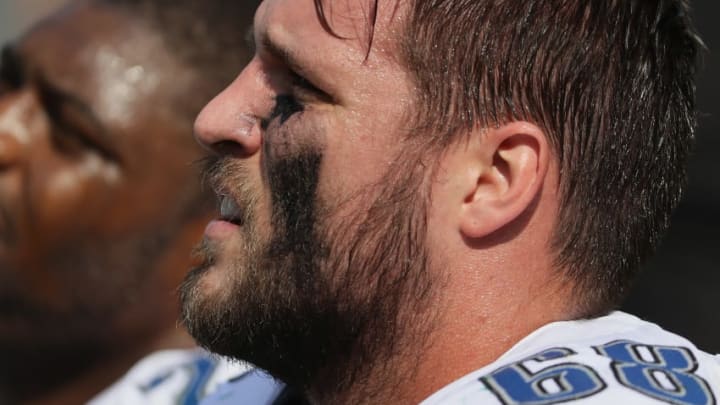 GREEN BAY, WI - SEPTEMBER 25: Taylor Decker #68 of the Detroit Lions sits on the bench during a game against the Green Bay Packers at Lambeau Field on September 25, 2016 in Green Bay, Wisconsin. The Packers defeated the Lions 34-27. (Photo by Jonathan Daniel/Getty Images)
