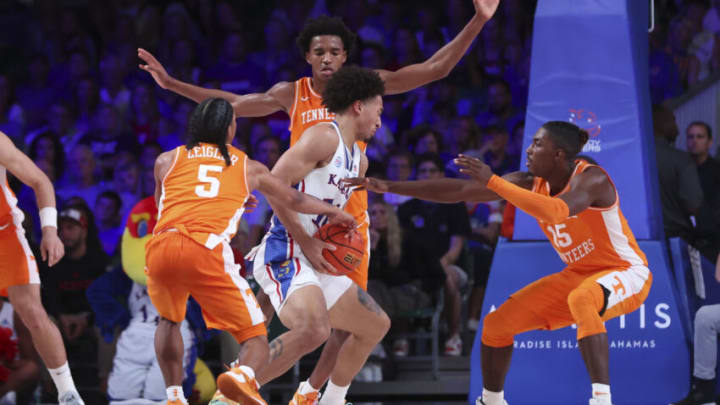 Nov 25, 2022; Paradise Island, BAHAMAS; Kansas Jayhawks forward Jalen Wilson (10) is defended by Tennessee Volunteers guard Zakai Zeigler (5) and Tennessee Volunteers guard Jahmai Mashack (15) during the second half at Imperial Arena. Mandatory Credit: Kevin Jairaj-USA TODAY Sports
