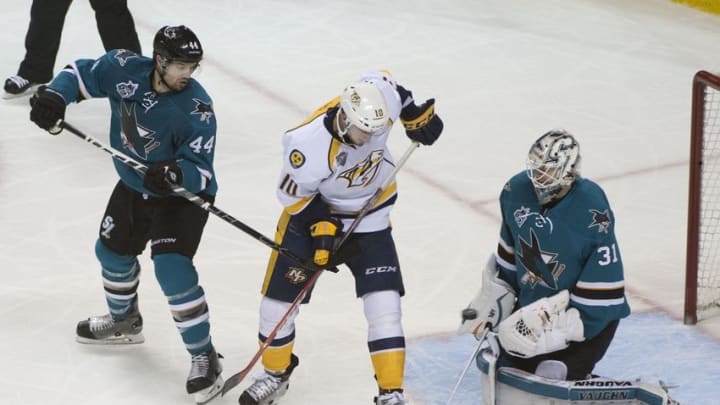 May 7, 2016; San Jose, CA, USA; San Jose Sharks goalie Martin Jones (31) makes a save against Nashville Predators center Colton Sissons (10) during the second period in game five of the second round of the 2016 Stanley Cup Playoffs at SAP Center at San Jose. Mandatory Credit: Kyle Terada-USA TODAY Sports