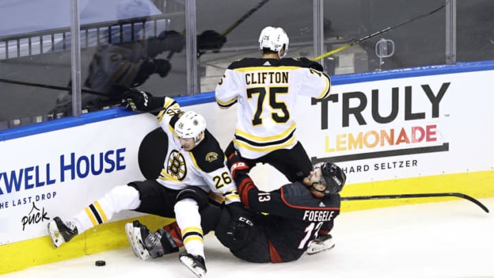 Boston Bruins, Par Lindholm #26, Connor Clifton #75 (Photo by Elsa/Getty Images)