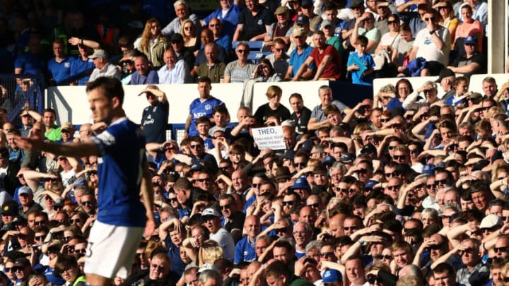 LIVERPOOL, ENGLAND - MAY 05: Everton fans shield their eyes during the Premier League match between Everton and Southampton at Goodison Park on May 5, 2018 in Liverpool, England. (Photo by Jan Kruger/Getty Images)