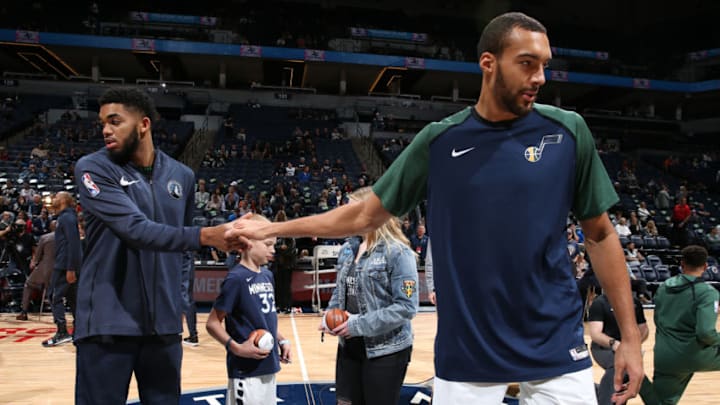 MINNEAPOLIS, MN - OCTOBER 31: Karl-Anthony Towns #32 of the Minnesota Timberwolves and Rudy Gobert #27 of the Utah Jazzz shake hands prior to the game between the Utah Jazz and the Minnesota Timberwolves on October 31, 2018 at Target Center in Minneapolis, Minnesota. NOTE TO USER: User expressly acknowledges and agrees that, by downloading and or using this Photograph, user is consenting to the terms and conditions of the Getty Images License Agreement. Mandatory Copyright Notice: Copyright 2018 NBAE (Photo by David Sherman/NBAE via Getty Images)