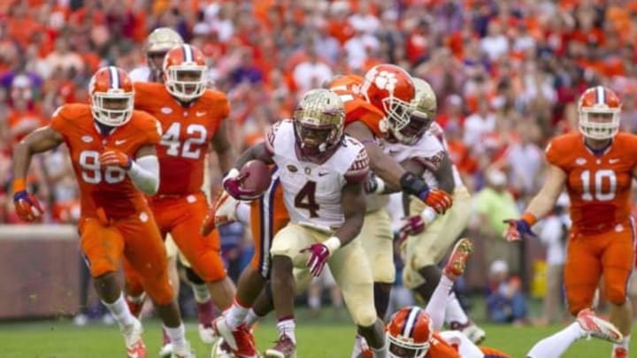 Nov 7, 2015; Clemson, SC, USA; Florida State Seminoles running back Dalvin Cook (4) carries the ball during the first half against the Clemson Tigers at Clemson Memorial Stadium. Mandatory Credit: Joshua S. Kelly-USA TODAY Sports