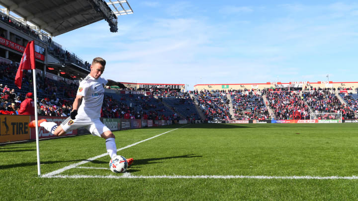 Mar 11, 2017; Chicago, IL, USA; Real Salt Lake midfielder Albert Rusnak (11) takes a corner kick during the second half of the match against the Chicago Fire at Toyota Park Mandatory Credit: Mike DiNovo-USA TODAY Sports