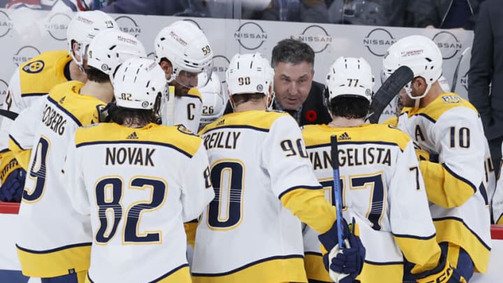 Nov 9, 2023; Winnipeg, Manitoba, CAN; Nashville Predators head coach Andrew Brunette talks with players during a time out in the third period against the Winnipeg Jets at Canada Life Centre. Mandatory Credit: James Carey Lauder-USA TODAY Sports