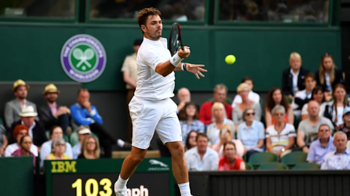 LONDON, ENGLAND - JULY 03: Stan Wawrinka of Switzerland plays a forehand during the Gentlemen's Singles first round match against Daniil Medvedev of Russia on day one of the Wimbledon Lawn Tennis Championships at the All England Lawn Tennis and Croquet Club on July 3, 2017 in London, England. (Photo by David Ramos/Getty Images)