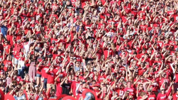 Sep 10, 2016; Madison, WI, USA; Wisconsin Badger fans celebrate “Jump Around” before the start of the fourth quarter during the game against the Akron Zips at Camp Randall Stadium. Wisconsin defeated Akron 54-10. Mandatory Credit: Mary Langenfeld-USA TODAY Sports