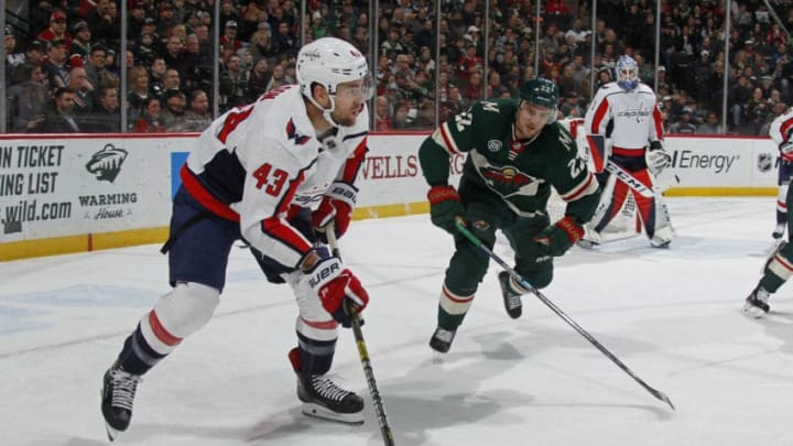 ST. PAUL, MN - NOVEMBER 13: Tom Wilson #43 of the Washington Capitals looks to pass as Nino Niederreiter #22 of the Minnesota Wild defends during a game between the Minnesota Wild and Washington Capitals at Xcel Energy Center on November 13, 2018 in St. Paul, Minnesota.(Photo by Bruce Kluckhohn/NHLI via Getty Images)