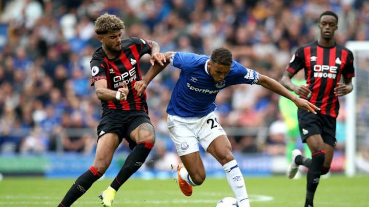 LIVERPOOL, ENGLAND - SEPTEMBER 01: Dominic Calvert-Lewin of Everton is challenged by Philip Billing of Huddersfield Town during the Premier League match between Everton FC and Huddersfield Town at Goodison Park on September 1, 2018 in Liverpool, United Kingdom. (Photo by Jan Kruger/Getty Images)