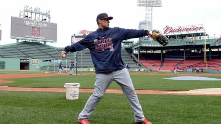 Oct 22, 2013; Boston, MA, USA; St. Louis Cardinals designated hitter Allen Craig throws during practice the day before game one of the 2013 World Series against the Boston Red Sox at Fenway Park. Mandatory Credit: Robert Deutsch-USA TODAY Sports