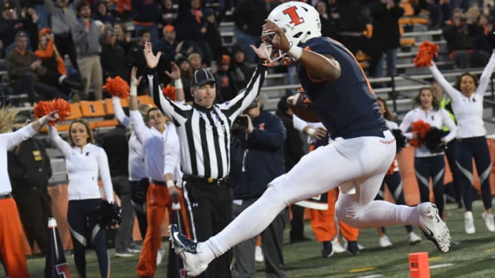 CHAMPAIGN, IL - NOVEMBER 03: Illinois Fighting Illini quarterback AJ Bush Jr (1) leaps in to the end zone during a Big Ten Conference football game on November 3, 2018, at Memorial Stadium, Champaign, IL. (Photo by Keith Gillett/Icon Sportswire via Getty Images)