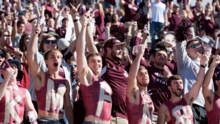 Oct 4, 2014; Starkville, MS, USA; Mississippi State Bulldogs fans cheer for their team during the game against the Texas A&M Aggies at Davis Wade Stadium. The Bulldogs defeated the Aggies 48-31. Mandatory Credit: Marvin Gentry-USA TODAY Sports