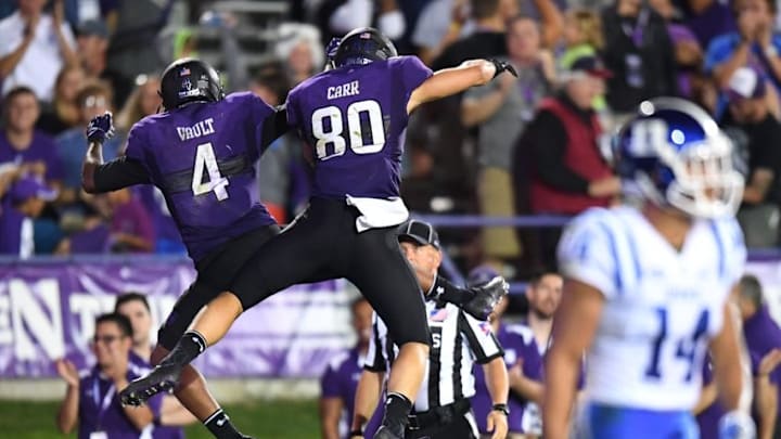 Sep 17, 2016; Evanston, IL, USA; Northwestern Wildcats wide receiver Solomon Vault (4) celebrates his touchdown with wide receiver Austin Carr (80) during the second half against the Duke Blue Devils at Ryan Field. Wildcats won 24-13. Mandatory Credit: Patrick Gorski-USA TODAY Sports