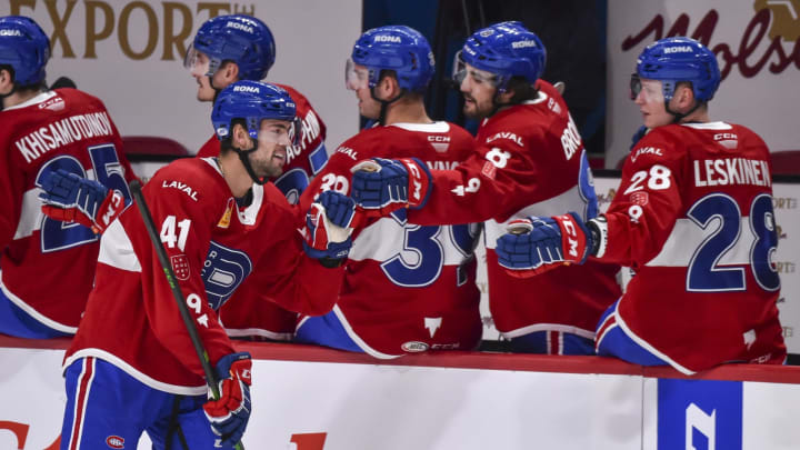 MONTREAL, QC – FEBRUARY 19: Ryan Poehling #41 of the Laval Rocket celebrates his goal with teammates on the bench during the first period against the Belleville Senators at the Bell Centre on February 19, 2021 in Montreal, Canada. (Photo by Minas Panagiotakis/Getty Images)