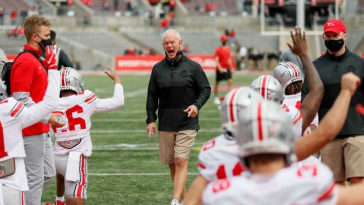 Team Brutus head coach Kerry Coombs leads players in stretching prior to the Ohio State football Spring Game at Ohio Stadium in Columbus on Saturday, April 17, 2021.Ohio State Football Spring Game