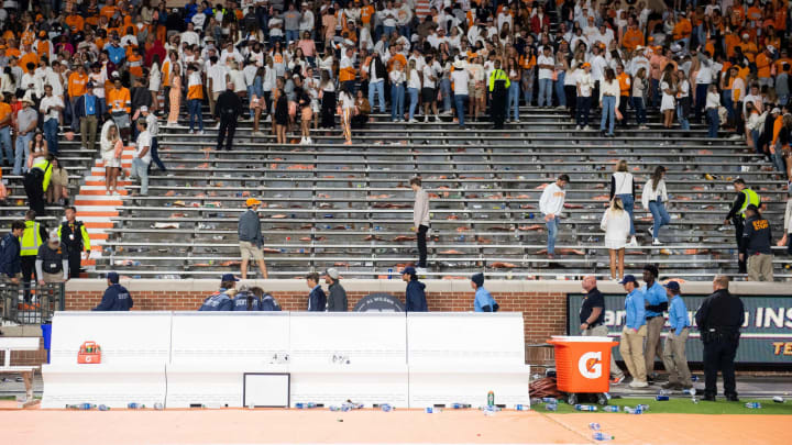 The Tennessee student section is pushed back after many students threw various objects onto the field during a football game between Tennessee and Ole Miss at Neyland Stadium in Knoxville, Tenn. on Saturday, Oct. 16, 2021.Kns Tennessee Ole Miss Football Bp