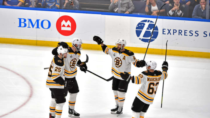 ST LOUIS, MISSOURI - JUNE 09: Zdeno Chara #33 of the Boston Bruins is congratulated by his teammates after scoring a third period empty-net goal against the St. Louis Blues in Game Six of the 2019 NHL Stanley Cup Final at Enterprise Center on June 09, 2019 in St Louis, Missouri. (Photo by Ed Zurga/Getty Images)