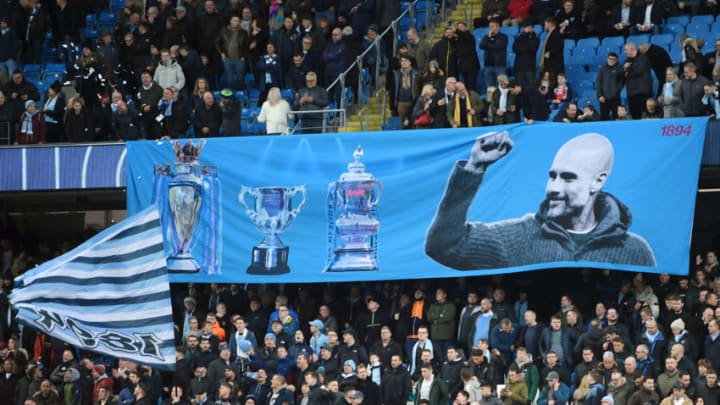 MANCHESTER, ENGLAND - DECEMBER 07: A banner is displayed with Pep Guardiola, Manager of Manchester City on during the Premier League match between Manchester City and Manchester United at Etihad Stadium on December 07, 2019 in Manchester, United Kingdom. (Photo by Michael Regan/Getty Images)