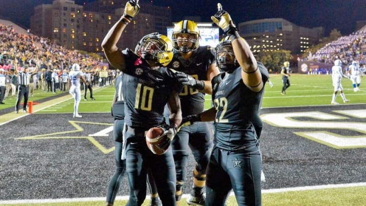 Oct 22, 2016; Nashville, TN, USA; Vanderbilt Commodores wide receiver Trent Sherfield (10) reacts after scoring a touchdown against the Tennessee State Tigers with teammate Commodores running back Josh Crawford (22) during the second half at Vanderbilt Stadium. Vanderbilt won 35-17. Mandatory Credit: Jim Brown-USA TODAY Sports