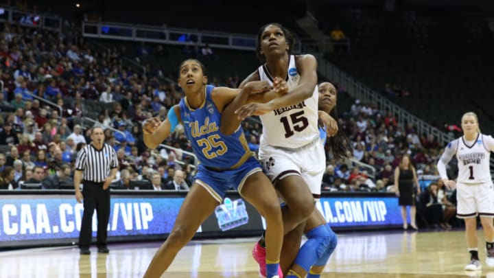 KANSAS CITY, MO - MARCH 25: UCLA Bruins forward Monique Billings (25) blocks out Mississippi State Lady Bulldogs center Teaira McCowan (15) for a rebound in the fourth quarter of a quarterfinal game in the NCAA Division l Women's Championship between the UCLA Bruins and Mississippi State Lady Bulldogs on March 25, 2018 at Sprint Center in Kansas City, MO. Mississippi State won 89-73 to advance to the Final Four. (Photo by Scott Winters/Icon Sportswire via Getty Images)