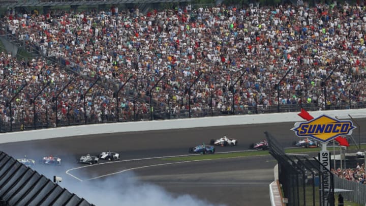 INDIANAPOLIS, IN - MAY 27: Helio Castroneves, driver of the #3 Pennzoil Team Penske Chevrolet, crashes during the 102nd Indianapolis 500 at Indianapolis Motorspeedway on May 27, 2018 in Indianapolis, Indiana.(Photo by Patrick Smith/Getty Images)