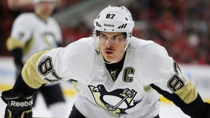 Nov 29, 2014; Raleigh, NC, USA; Pittsburgh Penguins forward Sidney Crosby (87) looks on against the Carolina Hurricanes at PNC Arena. The Pittsburgh Penguins defeated the Carolina Hurricanes 3-2. Mandatory Credit: James Guillory-USA TODAY Sports