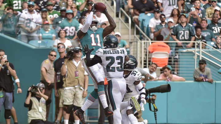 MIAMI, FLORIDA – DECEMBER 01: DeVante Parker #11 of the Miami Dolphins catches a touchdown in the third quarter against the Philadelphia Eagles at Hard Rock Stadium on December 01, 2019 in Miami, Florida. (Photo by Eric Esponda/Getty Images)