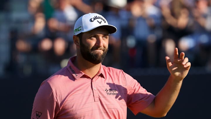 SANDWICH, ENGLAND - JULY 18: Jon Rahm of Spain acknowledges the fans as he approaches the green of the 18th hole during Day Four of The 149th Open at Royal St George’s Golf Club on July 18, 2021 in Sandwich, England. (Photo by Andrew Redington/Getty Images)