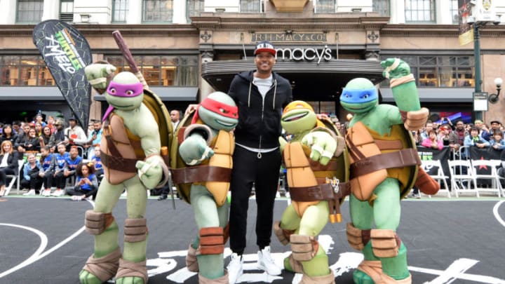 NEW YORK, NY - MAY 21: Basketball player Carmelo Anthony poses with the Teenage Mutant Ninja Turtles at Macy's Herald Square for the Launch of TMNT X Melo on May 21, 2016 in New York City. (Photo by Andrew Toth/Getty Images for Nickelodeon)