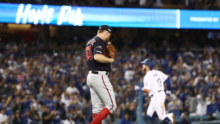 LOS ANGELES, CALIFORNIA - OCTOBER 04: Sean Doolittle #63 of the Washington Nationals reacts after giving up a solo home run to Max Muncy #13 of the Los Angeles Dodgers in the seventh inning in game two of the National League Division Series at Dodger Stadium on October 04, 2019 in Los Angeles, California. (Photo by Sean M. Haffey/Getty Images)
