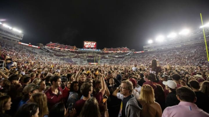Members of the Florida State Seminoles football team and fans celebrate the team’s victory over the Florida Gators at Doak Campbell Stadium on Friday, Nov. 25, 2022.Fsu V Uf Second Half1469