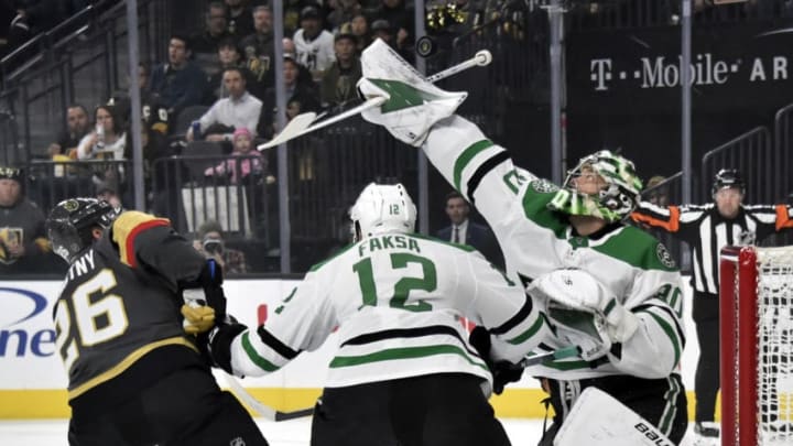 LAS VEGAS, NV - FEBRUARY 26: Ben Bishop #30 of the Dallas Stars makes reaches to block the puck during the first period against the Vegas Golden Knights at T-Mobile Arena on February 26, 2019 in Las Vegas, Nevada. (Photo by David Becker/NHLI via Getty Images)