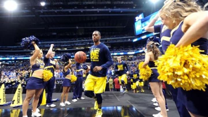 Mar 30, 2014; Indianapolis, IN, USA; Michigan Wolverines forward Glenn Robinson III takes the court before the finals of the midwest regional of the 2014 NCAA Mens Basketball Championship tournament against the Kentucky Wildcats at Lucas Oil Stadium. Mandatory Credit: Thomas J. Russo-USA TODAY Sports