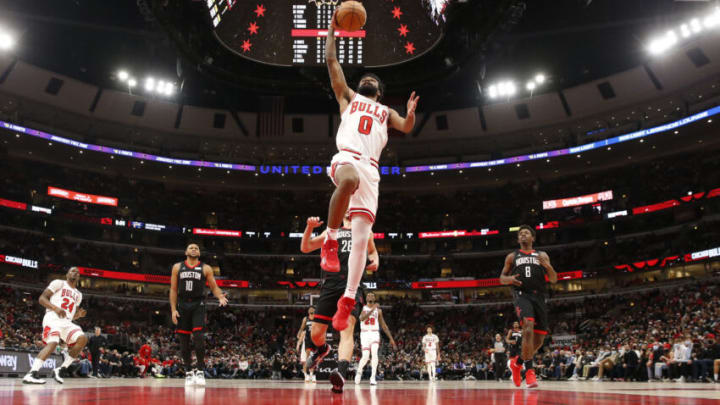 CHICAGO, ILLINOIS – DECEMBER 20: Coby White #0 of the Chicago Bulls drives to the basket during the game against the Houston Rockets at the United Center on December 20, 2021 in Chicago, Illinois. NOTE TO USER: User expressly acknowledges and agrees that, by downloading and or using this photograph, User is consenting to the terms and conditions of the Getty Images License Agreement. (Photo by Nuccio DiNuzzo/Getty Images)