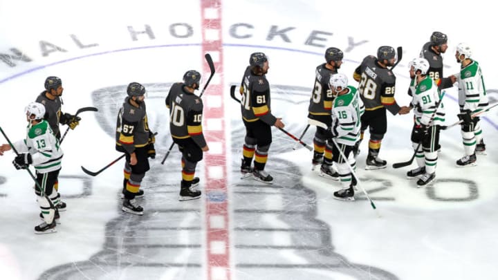 The Vegas Golden Knights and the Dallas Stars shake hands following the Stars 3-2 overtime victory in Game Five of the Western Conference Final. (Photo by Bruce Bennett/Getty Images)