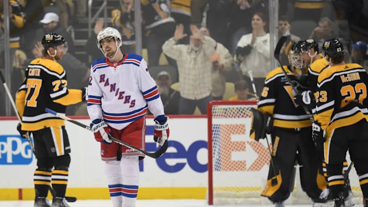 PITTSBURGH, PA - DECEMBER 20: Filip Chytil #72 of the New York Rangers skates off the ice as the Pittsburgh Penguins celebrate a 3-2 win over the Rangers at PPG PAINTS Arena on December 20, 2022 in Pittsburgh, Pennsylvania. (Photo by Justin Berl/Getty Images)
